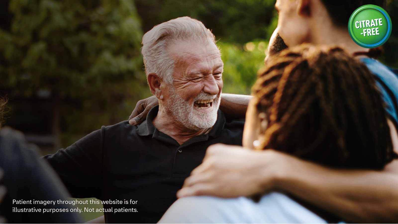 Group Of People With Arms Round Shoulders Laughing